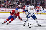  Young Leafs defenceman Rasmus Sandin keeps the puck away from the Canadiens’ Jonathan Drouin in a game from 2020. Sandin has impressed in his recent spate of games on the Leafs’ blue line. GETTY IMAGES