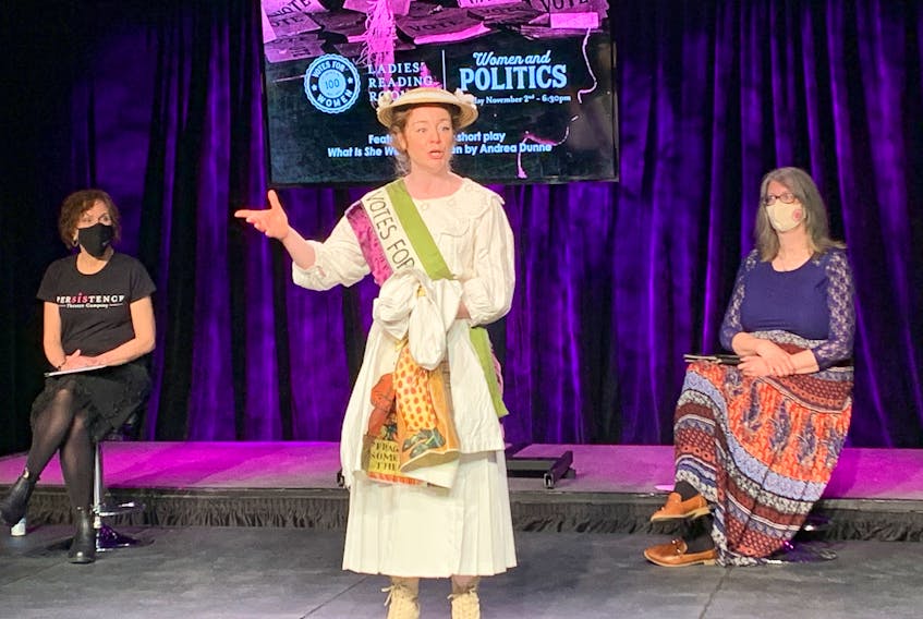 Allison Kelly performs a segment from the play "What is She Wearing" Tuesday during an event held at Canadian AV facility in St. John’s and hosted by the PerSIStence Theatre Company to commemorate the 100th anniversary of property-owning women obtaining the right to vote in municipal elections.