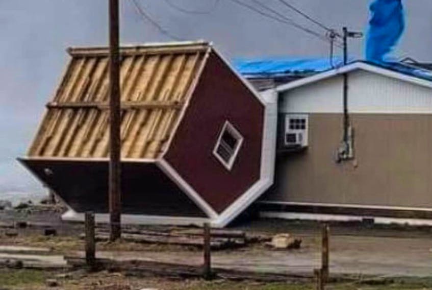 High winds uprooted a shed in Lark Harbour on Monday which then came to rest on the side of Myrtles on the Bay. Restaurant owner Victoria Snow figures if it had picked up any more momentum it would have gone right through the building.