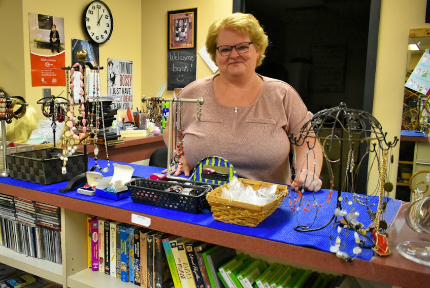 Belinda Woods at the Free Store in Summerside, PEI. After growing up in an abusive home in Cape Breton, Woods has found a way to heal by helping others.