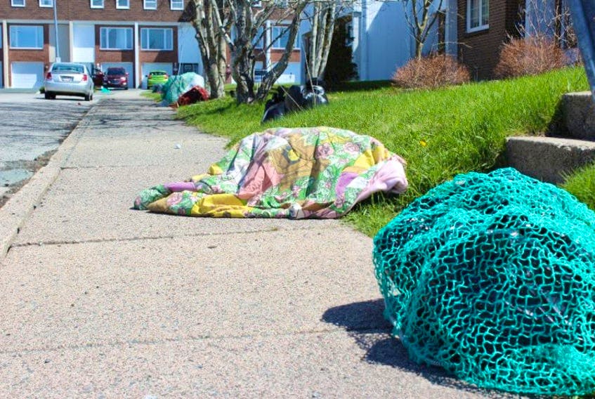 St. John’s city council voted 5-4 Tuesday to deny a motion to amend a section of the sanitation regulation bylaw that would have allowed some residents to use blankets to cover their garbage. 