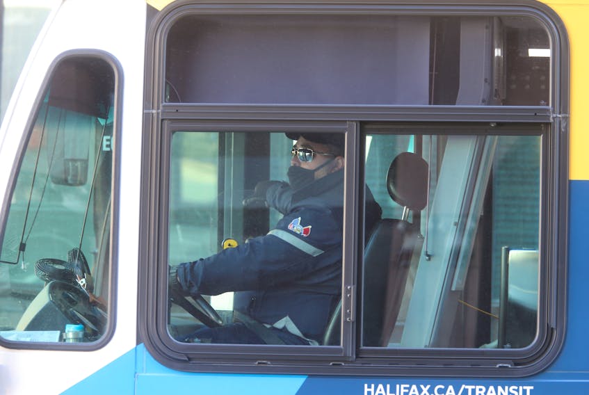 FOR LOCKDOWN STORIES:
A Metro Transit driver wheels their bus on Barrington Street on the first day of a province-wide lockdown in Halifax Wednesday April 28, 2021.

TIM KROCHAK PHOTO