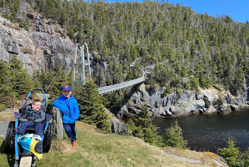 Five-year-old brothers Lyndon and Zander were able to hike the LaManche trail with their mother, Adina Stamp, earlier this month thanks to a specialized wheechair, which the family borrowed from the Janeway children's hospital for Lyndon. - Contributed