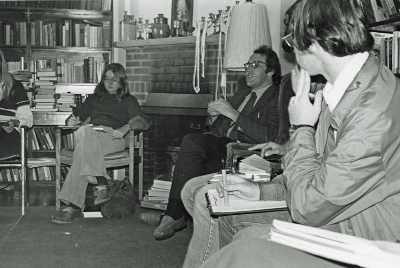 Wayne Hankey lectures during a tutorial on the University of King's College campus in 1976 when he was the director of the school's Foundation Year Program. - Dalhousie Archives