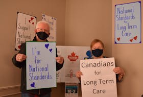 Leo Broderick, left, who is with the Council for Canadians, and Mary Boyd, who is with the P.E.I. Health Coalition, stand in support of national standards for long-term care homes. They attended a virtual rally on April 27. 