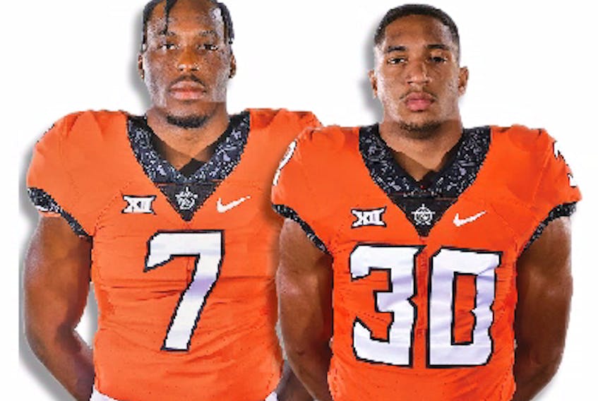 Linebacker Amen Ogbongbemiga (left) from Calgary, and Edmonton running back Chuba Hubbard -- teammates on the Oklahoma State Cowboys -- are both projected to be potential Day 3 picks in the NFL draft later this month. 
