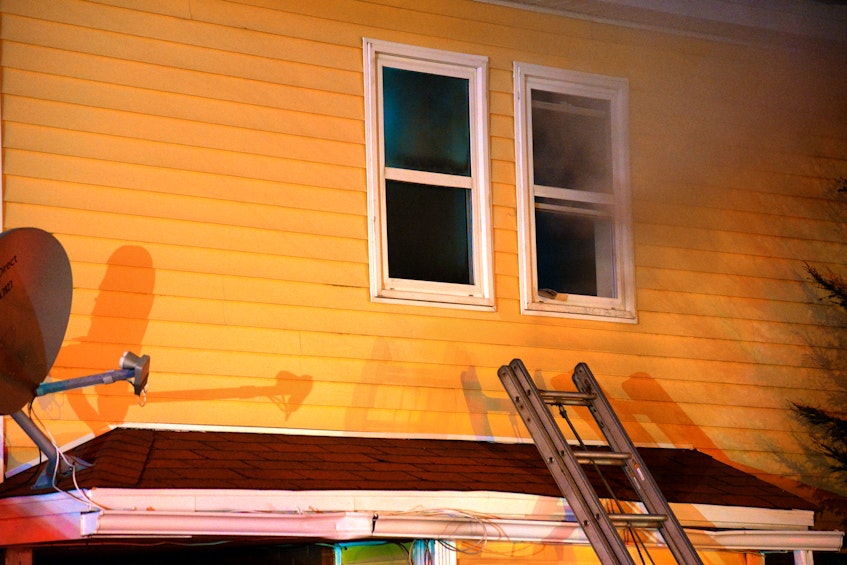 A man and child were rescued from this overhang at a house fire on Hamlyn Road in St. John's Friday night. Keith Gosse/The Telegram