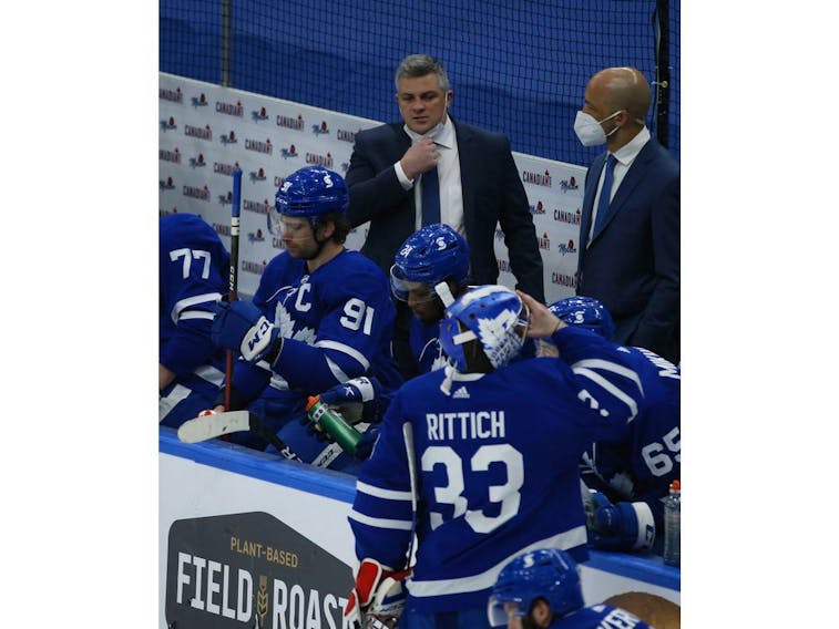 Dermott congratulated at Leafs bench after scoring his first NHL goal : r/ leafs