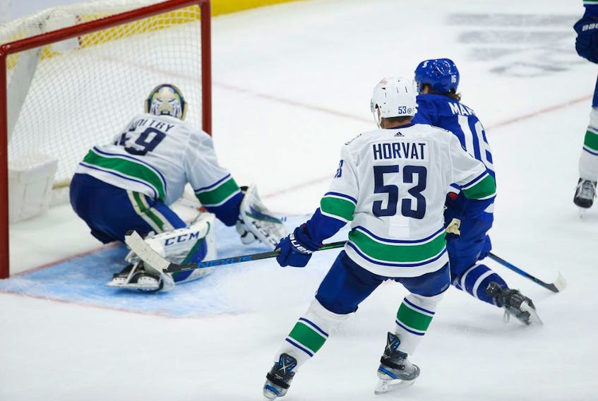 Toronto Maple Leafs Mitch Marner RW (16) scores after capitalizing on Vancouver Canucks Braden Holtby G (49) giveaway during the third period in Toronto on Thursday April 29, 2021. Jack Boland/Toronto Sun/Postmedia Network