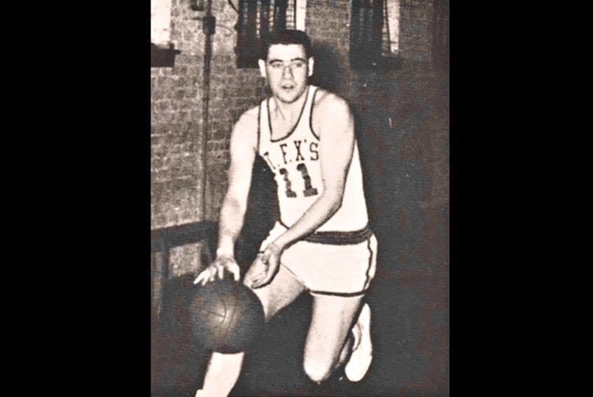 Karl Marsh of New Waterford, shown playing for St. Francis Xavier University in Antigonish, was known as an all-round athlete, coach, sports historian and artist. Marsh, a longtime staple in the town's sports community, died Thursday after a short battle with cancer. He was 84. CONTRIBUTED