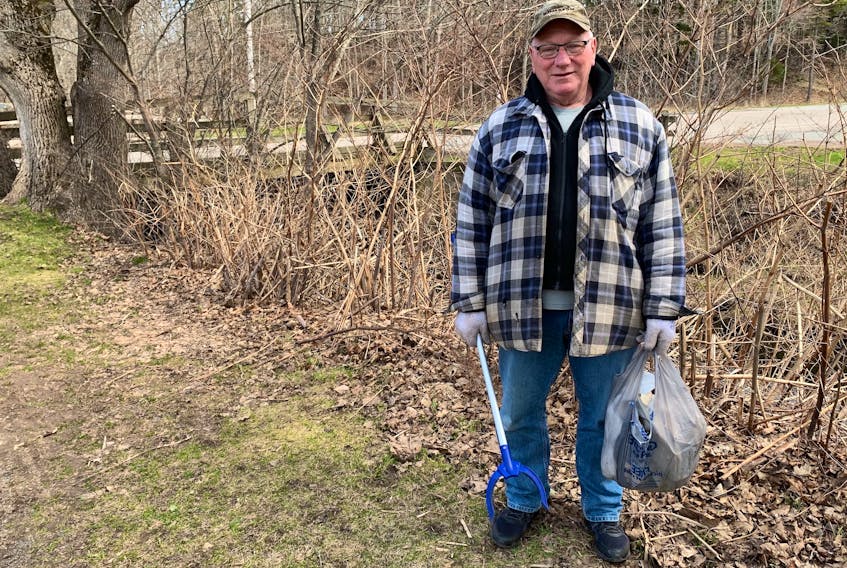 Walter Fortune walks in Victoria Park every day with a garbage picker in hand. Fortune likes to pitch in and help keep the area clean. JOEY SMITH