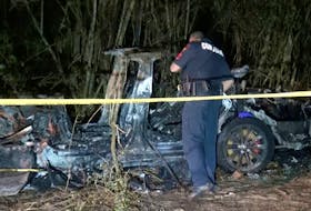 The remains of a Tesla vehicle are seen after it crashed in The Woodlands, Texas on April 17, in this still image from video obtained via social media. SCOTT J. ENGLE via REUTERS File Photo