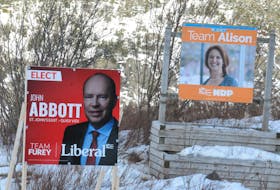 Campaign signs for St. John’s East-Quidi Vidi Liberal John Abbott and New Democratic Party Leader Alison Coffin during the election.
Joe Gibbons/The Telegram
