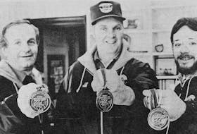 Clarence Redden, Ernie Hunt and Junior Moore were all smiles when displaying their silver medals after returning from the 1986 CAN/AM International Gentlemen’s Hockey Tournament in Quebec City. The Windsor Moosehead Exports gentlemen’s hockey team lost in the gold medal game 5-4.