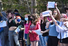 Students walked out of West Kings District High School in Auburn on Thursday afternoon in support of a female student who says she was suspended after bringing to light a shirt a male student was wearing which read "'Tis the season to be rapey." - Ashley Thompson