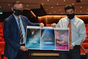 Steve Bellamy, left, CEO of the Confederation Centre of the Arts, and Adam Brazier, artistic director of the Charlottetown Festival, display posters for the three shows that will be featured on stage in the Homburg Theatre. The shows are, from left, Between Breaths, Dear Rita and Old Stock: A Refugee Love Story.