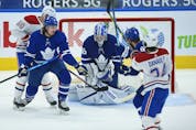  Maple Leafs goalie Jack Campbell makes a save in heavy traffic in front of the net during the second period in Toronto on Wednesday, April 7, 2021. JACK BOLAND/TORONTO SUN