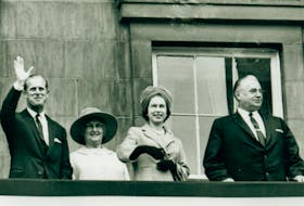 Prince Philip, left, Margaret Shaw, the Queen and P.E.I. Premier Walter R. Shaw are shown on the balconey of Province House in Charlottetown during the 1964 Royal Visit. 