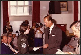 Prince Philip receives a gift from an air cadet during a Royal visit to Newfoundland and Labrador in 1978. PHOTO COURTESY OF THE ROOMS 	
(VA 70-14.2)
 