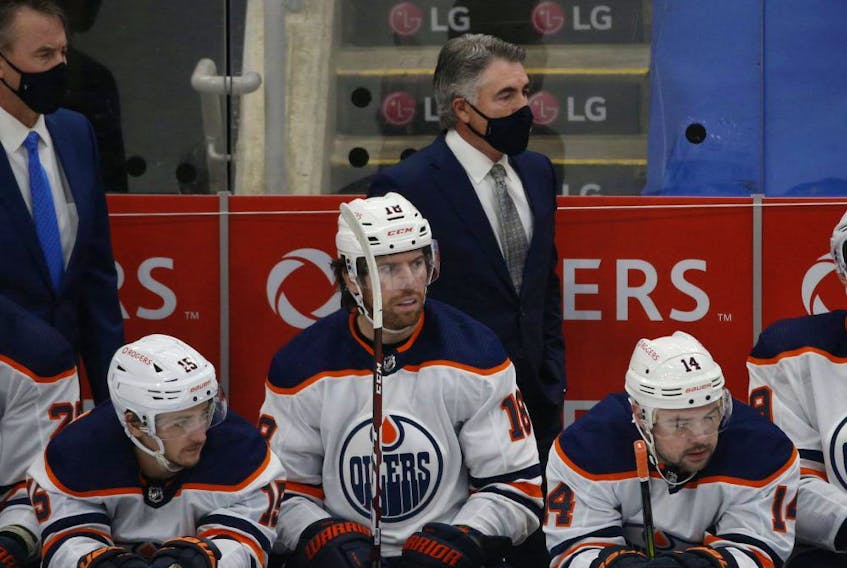 Edmonton Oilers coach Dave Tippett behind the bench during the first period in Toronto on Friday January 22, 2021.