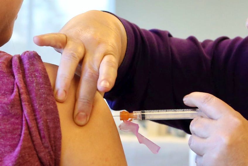 A person receives a COVID-19 vaccine. 