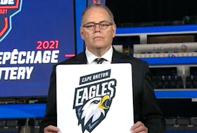 Pierre Leduc, QMJHL director of hockey operations, unveils the Cape Breton Eagles as the second overall pick for the 2021 QMJHL Entry Draft during the league’s annual draft lottery on Tuesday. PHOTO/QMJHL