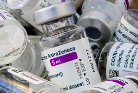 Empty vials of Oxford/AstraZeneca's COVID-19 vaccine 
