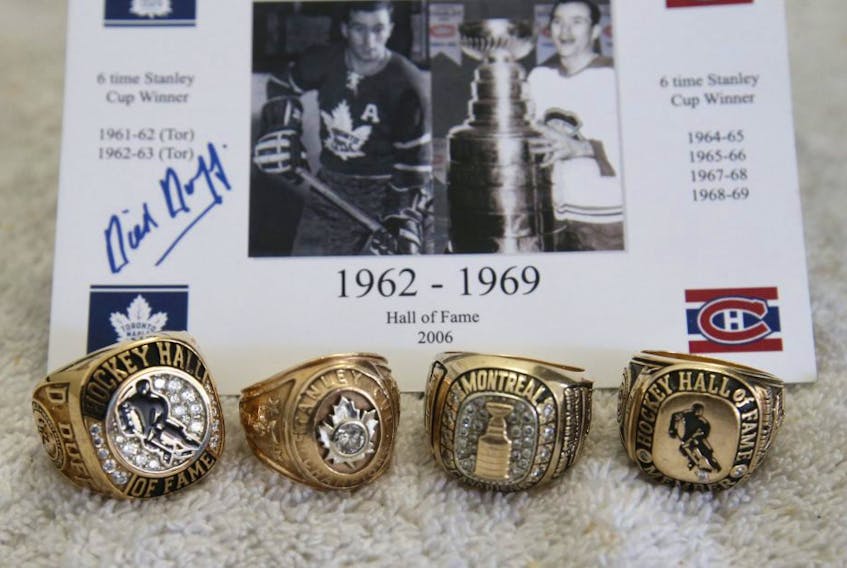  The legendary Dick Duff shows off his memorabilia, including Stanley Cup and Hockey Hall of Fame rings. JACK BOLAND/TORONTO SUN 