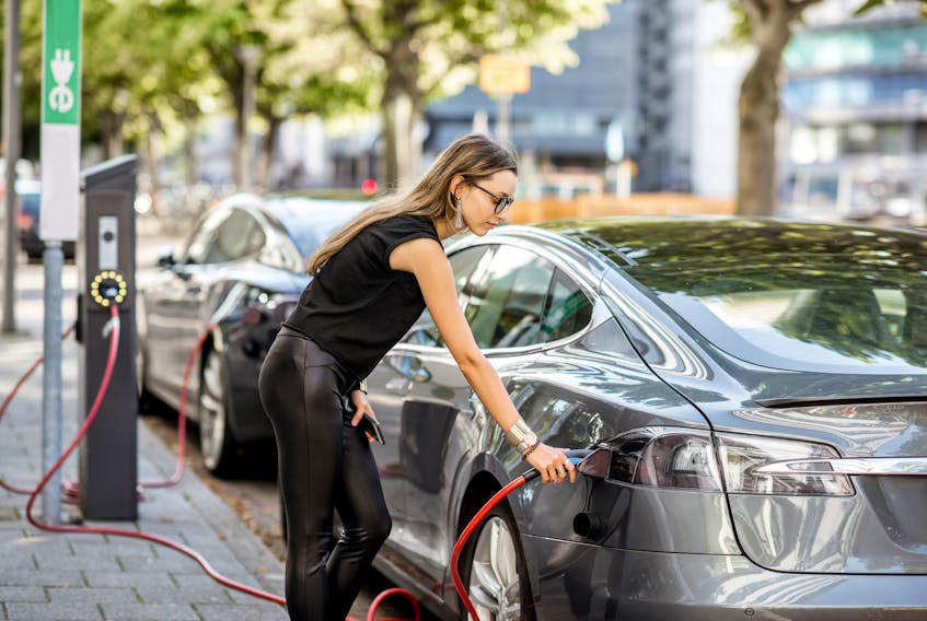 While studies show women represent the majority of new car buyers, a great percentage of men seem to be buying electric vehicles. 123rf stock photo 

 