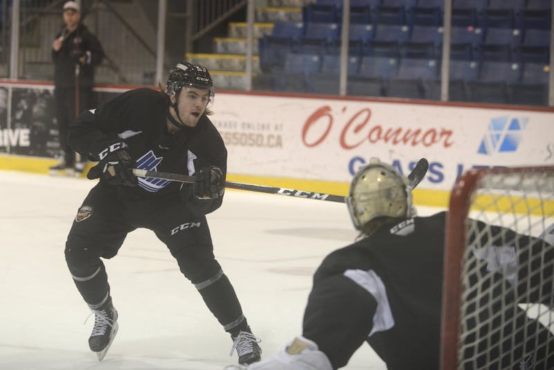Brendan McCarthy fires a shot on goal during a Charlottetown Islanders practice before they departed for Quebec to compete in the Quebec Major Junior Hockey League playoffs. - Jason Malloy