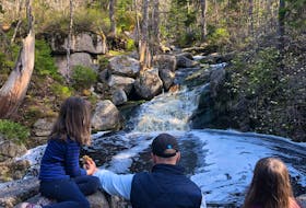 Heather Fegan's family enjoys the waterfall on the Long Lake Provincial Park Pipeline Trail. 