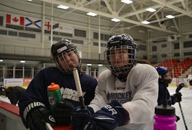 Carly Gould, left, of We'koqma'q and Nevaeh Doucette of Membertou were joking around on the ice at the Membertou Sport and Wellness Centre in February as part of the Female Indigenous Hockey Program aimed at bringing more opportunities for Indigenous girls to join hockey. Hockey Nova Scotia announced it will make changes to make the game more welcoming for historically marginalized groups. ARDELLE REYNOLDS/CAPE BRETON POST