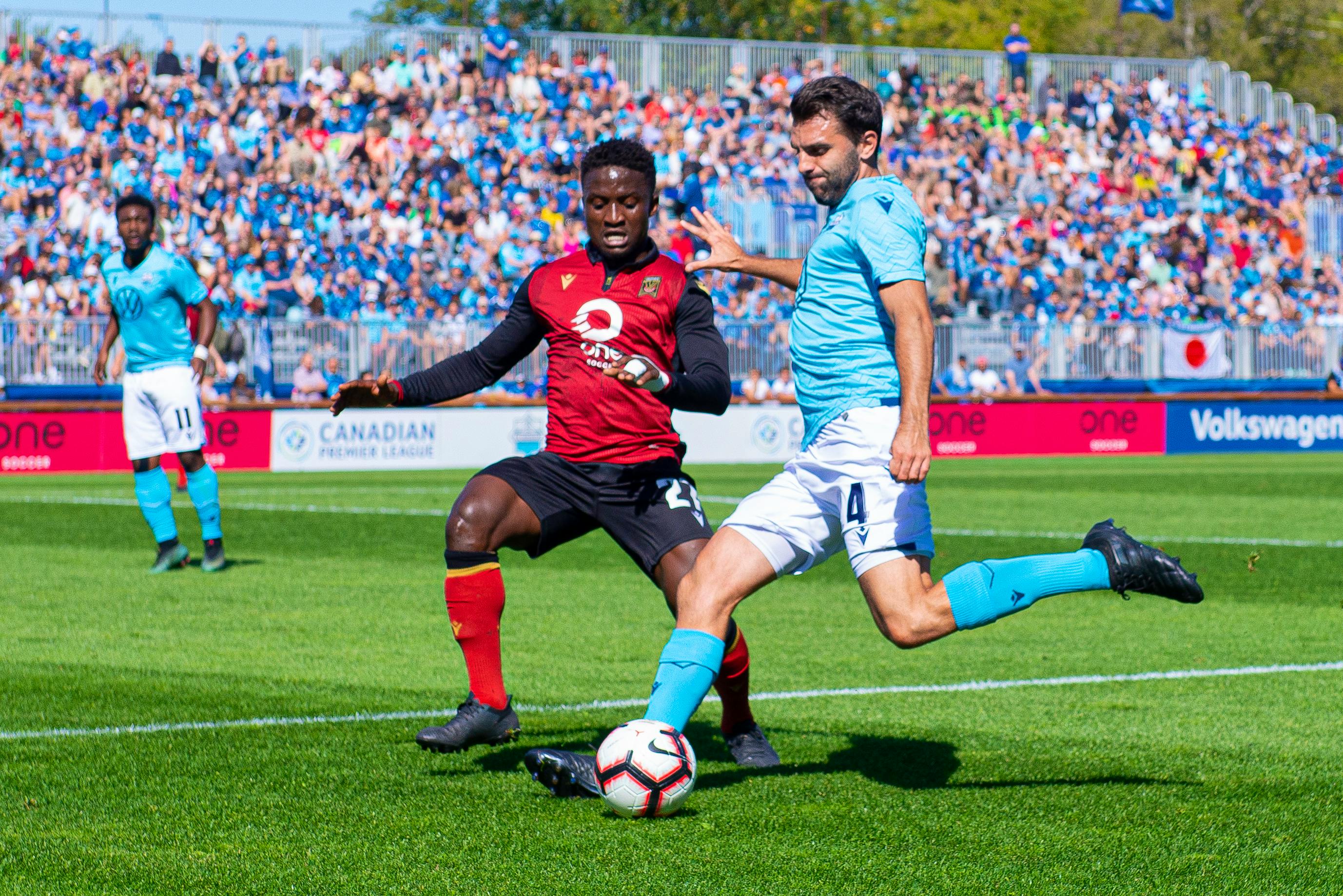 HFX Wanderers defender Alex De Carolis fends off a Valour FC attacker during a Canadian Premier League game in 2019 at the Wanderers Grounds. - HFX WANDERERS