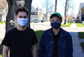 Tyler Murnaghan, left, and Hal Atwood led the local organizing of the International Day Against Homophobia, Transphobia and Biphobia, which is today. 