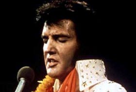 Elvis Presley performs in concert during his "Aloha From Hawaii" 1972 television special. — Reuters file photo
