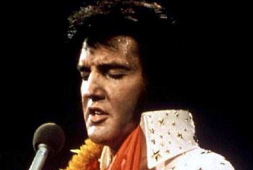 Elvis Presley performs in concert during his "Aloha From Hawaii" 1972 television special. — Reuters file photo