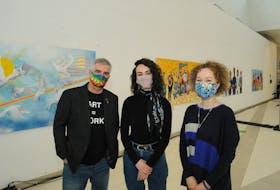 With their work behind them, pictured are artists. Pictured are artists Nelson White, Molly Margaret and Anastasia Tiller. Missing from photo is Amber-Lynn Thorne, who was unable to attend the event.
