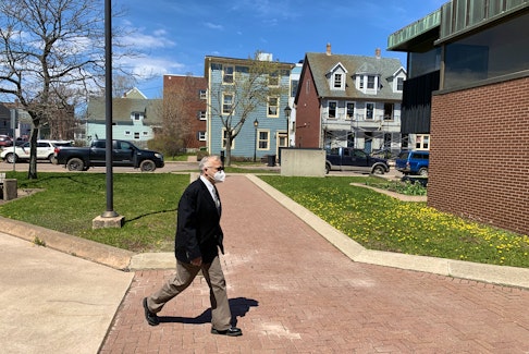 Edward Thomas Mundle walks to P.E.I. Supreme Court during a recent appearance where he is on trial for one count of sexual assault. 