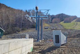 Construction of Atlantic Canada’s first gondola lift continues at Ski Cape Smokey in Ingonish. The new transportation system, which will carry passengers to the top in eight-person cars, is part of a $130-million plan to redevelop the hill into an all-season resort. CONTRIBUTED