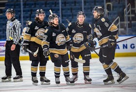 Charlottetown Islanders defenceman Noah Laaouan, right, celebrates his goal with teammates, from second right, Keiran Gallant, Zac Beauregard and Lukas Cormier in Game 1 of the Quebec Major Junior Hockey League semifinal in Quebec City. – Jonathan Roy