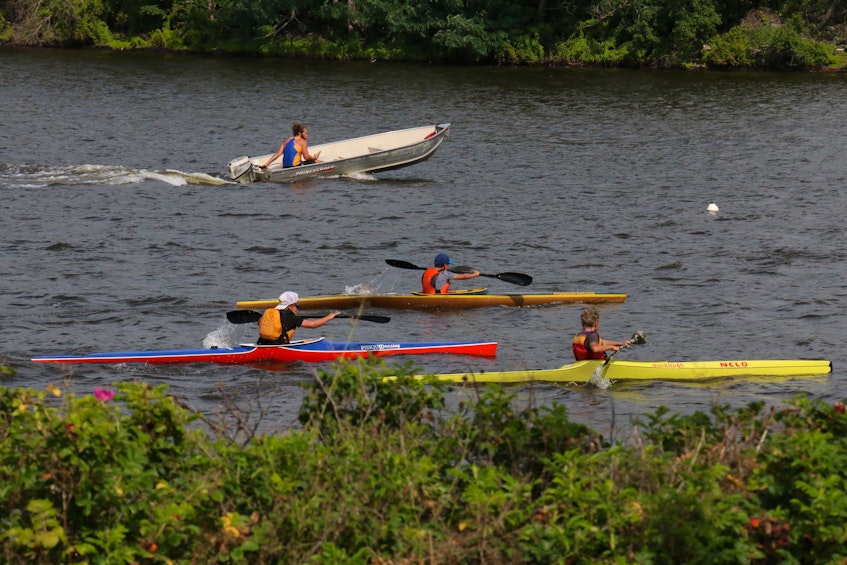 In 2020, due to the pandemic, the Pisiquid Canoe Club was one of the few recreational opportunities still available in West Hants for youth to participate in. Pictured here is a coach offering encouragement to paddlers during practice. For the past 40-plus years, that’s been a common sight on Lake Pisiquid during the summer months. - Carole Morris-Underhill