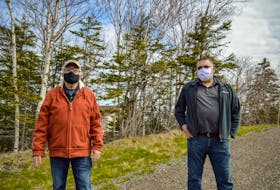 Dominion residents Ron Mazzocca, left, and Ron Campbell stand on the Coal Town Trail in Dominion. JESSICA SMITH • CAPE BRETON POST