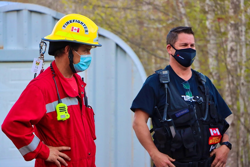 Windsor firefighter Jonathan Swinamer and safety officer Capt. Chris Sullivan were among those who responded May 17 for a possible forest fire on the Mines Road in Falmouth. 
Adrian Johnstone
 - Contributed