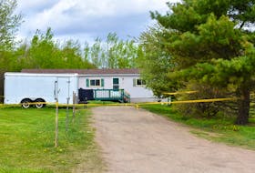 There was a home invasion at this trailer on Ridge Road in Melanson on the morning of May 24, 2020, and the suspects were seen leaving the area in a grey van. A few hours later, Robert Campbell's remains were found in a burned-out grey van in St. Croix. RCMP announced Wednesday that four people face charges in the homicide.