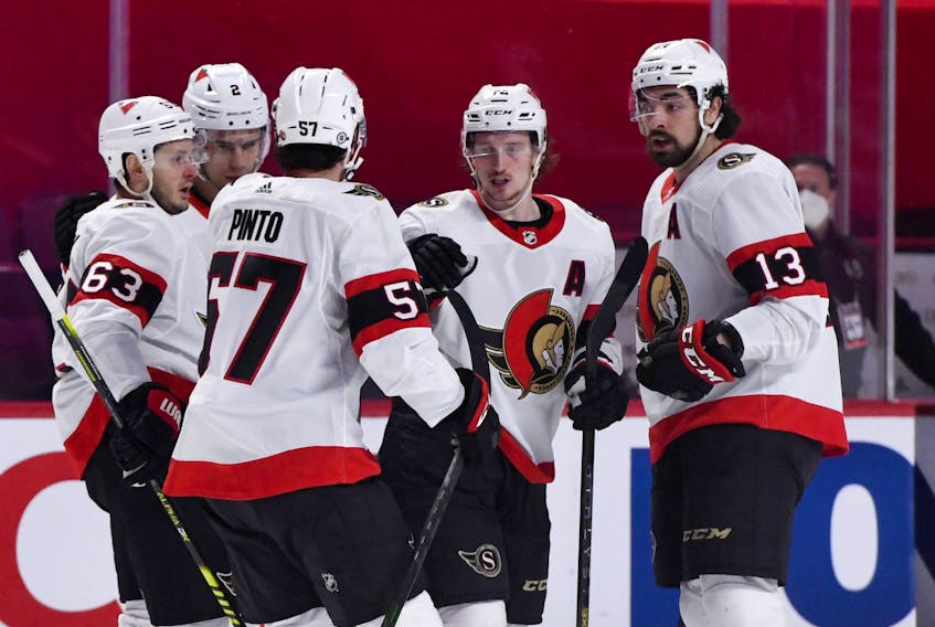 Ottawa Senators defenceman Thomas Chabot (72) reacts with teammates after scoring a goal against the Montreal Canadiens on Saturday.