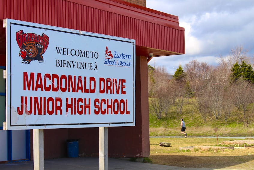 Macdonald Drive Junior High School is one of four schools out of 93 on the Avalon scheduled to be on a "compressed" school day as of today. Students will not be allowed to leave school grounds for the entire day, their lunch break is shortened to 20 minutes and their recess to five minutes. As well, they will get out of school an hour earlier than what was called for in the previous schedule.. — Andrew Waterman/The Telegram