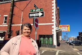 Maggie Lillo, who is the mother of Rafe Wright, stands around the corner from the block where the family lived on Dorchester Street in 2008. The mother of eight lived in the house for seven years before being evicted due to renovations. She was evicted again in 2018 for the same reason. 