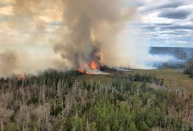 Lands and Forestry crews are on the scene for a second day , fighting two fires near Barrington Lake. Nova Scotia Department of Lands and Forestry photo