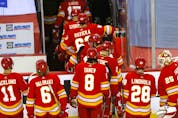  Calgary Flames’ bench during their last game of the season against the Vancouver Canucks in NHL action at the Scotiabank Saddledome in Calgary on Wednesday, May 19, 2021.