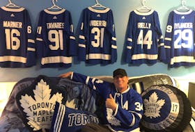 Bruce MacAulay of Glace Bay is shown in his Toronto Maple Leafs shrine and will be rooting for the blue and white in their playoff series with the Montreal Canadiens. MacAulay has been a Maple Leafs fan for more than 35 years. CONTRIBUTED